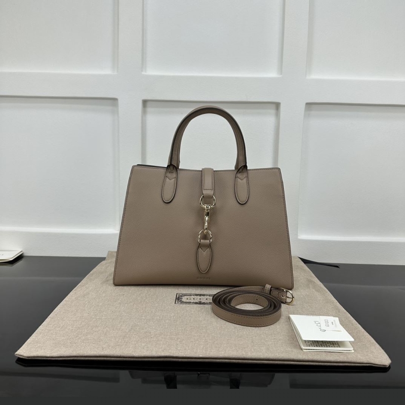 G*u*i shopping bags